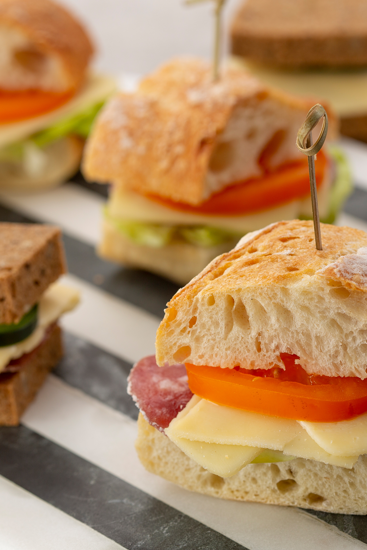 Mini sandwiches with Brie slices Ile de France Cheese