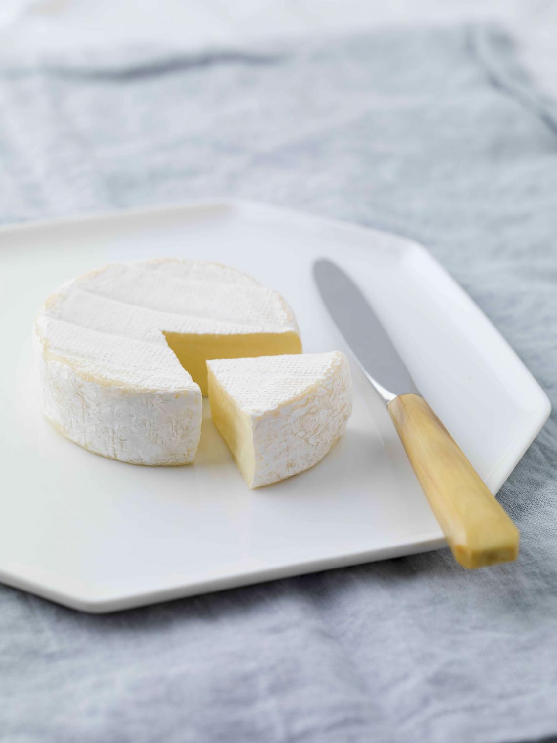 ILE DE FRANCE® petit camembert on a plate ILE DE FRANCE® petit camembert on a plate