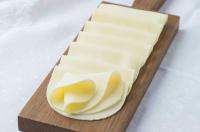 ILE DE FRANCE® Tranches de Brie on a plate ILE DE FRANCE® Tranches de Brie on a plate